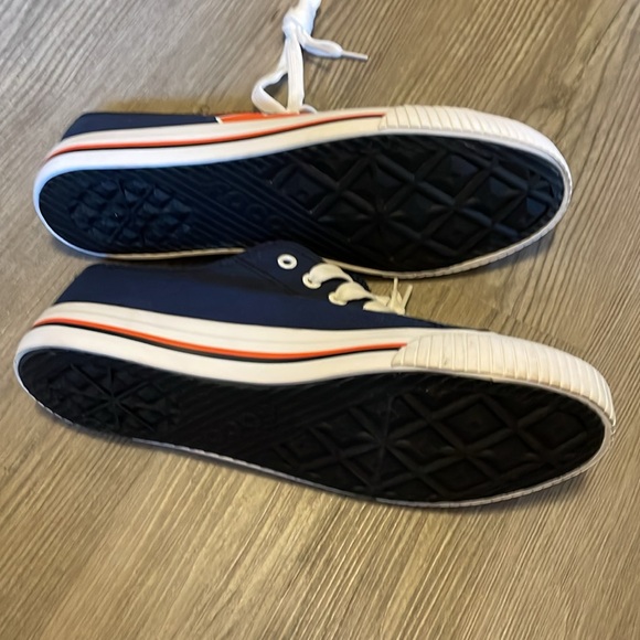 This is a NEW pair of SU sneakers . Men’s size 9. Navy blue with orange . - Picture 4 of 4